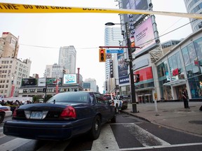 Toronto Police respond after the June 2 shooting at the Eaton Centre. (QMI AGENCY PHOTO)