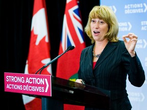 Laurel Broten, Minister of Education, addresses the media at a government building in downtown Toronto. Broten was addressing proposed measures in regards to contract negotiations with Ontario teachers. 
QMI AGENCY