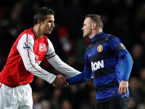 Robin van Persie (left) and Wayne Rooney will be teammates for Manchester United this season. (Getty Images)