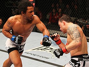 Benson Henderson (left) punches Frankie Edgar during their most recent encounter at UFC 144. (Getty Images file photo)