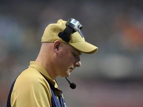 Winnipeg Blue Bombers coach Paul LaPolice stands on the sidelines during the second half of the CFL's 99th Grey Cup football game against the BC Lions in Vancouver, British Columbia November 27, 2011. (REUTERS)