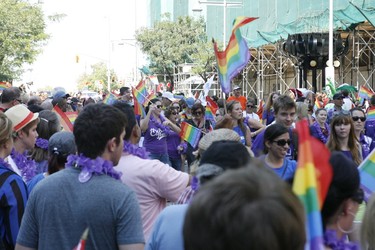 Thousands lined Wellington Ave., Bank St. and Laurier Ave. as the annual Capital Pride Parade wound through downtown Ottawa on Sunday. (Chris Hofley/Ottawa Sun)
