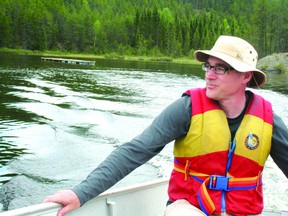 Trent University professor of aquatic science Paul Frost pictured on Experimental Lakes Area Lake 222. The RM of Woodlands has joined the call for the federal government to reconsider cutting funding to the Kenora, Ont. area project. The project is expected to shut down by Mar. 31, 2013. (FILE PHOTO)