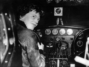 An undated picture taken in the 1930s shows American aviator Amelia Earhart at the controls of her plane. (AFP, file)