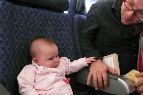 Infant in airplane seat