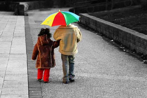 Children with umbrella