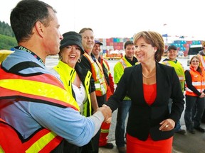 B.C. Premier Christy Clark meets with port workers before announcing the "Canada Starts Here: The BC Jobs Plan" in Prince Rupert, B.C. September 19, 2011.