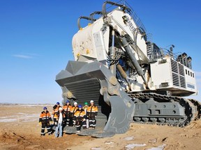 Miners with an excavating machine at the Ovoot Tolgoi coal mine in southern Mongolia.