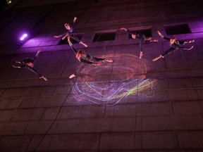 Aeriosa performs Being on the side of the seven-story Scotiabank Dance Centre. Photo: Tim Matheson