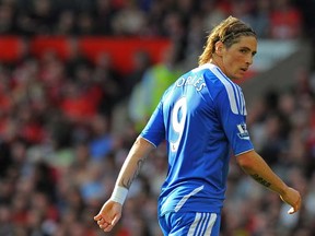 Chelsea's Spanish striker Fernando Torres looks on during the English Premier League football match between Manchester United and Chelsea at Old Trafford in Manchester, north-west England on September 18, 2011. AFP PHOTO/ANDREW YATES  RESTRICTED TO EDITORIAL USE. No use with unauthorized audio, video, data, fixture lists, club/league logos or ÃÆËliveÃÆË services. Online in-match use limited to 45 images, no video emulation. No use in betting, games or single club/league/player publications (Photo credit should read ANDREW YATES/AFP/Getty Images) [PNG Merlin Archive]