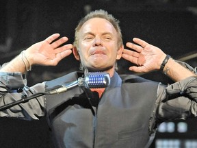 VANCOUVER, BC.:  JUNE 2, 2010 -  Sting listens to the audience with his tongue out early in the first concert of  his "Symphonicity Tour: Sting, featuring the Royal Philharmonic Concert Orchestra, conducted by Stephen Mercurio" at the Centre in Vancouver for Performing Arts Wednesday,  June 2, 2010 in Vancouver, B.C. (Ian Lindsay/ PNG)