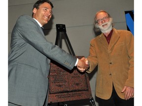 Vancouver Mayor Gregor Robertson (left)  and author W.P. (Bill) Kinsella with plaque representing the 15th George Woodcock Lifetime Achievement Award at the Vancouver Public Library in Vancouver, B.C. on June 9, 2009. The plaque will be installed outside the Library on Writer's Walk. (Steve Bosch/Vancouver Sun)