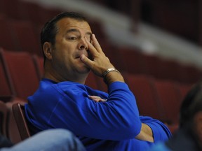 VANCOUVER, BC.: SEPTEMBER 19, 2011 -- Coach Alain Vigneault watches during Vancouver Canucks NHL hockey training camp at Rogers Arena in Vancouver, B.C., September 19, 2011.

(Arlen Redekop photo/ PNG)

(For story by [reporters])

00055959A