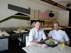 VANCOUVER, BC., JUNE 30, 2011 -- Chef/owner David Hawksworth (l) and chef de cuisine Kristian Eligh showing their food at Hawksworth in front of Rodney Graham painting at the renovated Georgia Hotel in Vancouver, BC., June 30, 2011.

(Nick Procaylo/PNG)