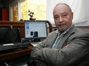 Jon Newton in front of his computer at his home in Lake Cowichan, B.C. Photo by Adrian Lam, Times Colonist