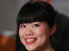MONTREAL, QUEBEC; MAY 3,  2011 -- Newly-elected New Democratic Party MP and McGill student  Laurin Liu smiles while answering a reporter's question at a news conference at Thomas Mulcair's campaign office in Montreal May 3, 2011.                    (John Mahoney/THE GAZETTE)