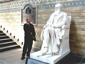 Douglas Todd admires Charles Darwin sculpture in London, England