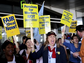 TORONTO, ONTARIO: JUNE 9, 2011 - Air Canada  sales and service agents and Canadian Auto Workers (CAW) members protest at Pearson International Airport in Toronto, Ontario. (Tyler Anderson/National Post)