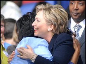 Hilary Rodham Clinton hugging supporter