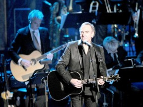 Inductee Neil Diamond performs onstage at the 26th annual Rock and Roll Hall of Fame Induction Ceremony at The Waldorf-Astoria on March 14, 2011 in New York City. (Photo by Michael Loccisano/Getty Images)