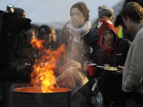 VANCOUVER. NOVEMBER 08 2011. Occupy Vancouver supporters gather around the sacred fire at Occupy Vancouver, Vancouver, November 08 2011. Gerry Kahrmann  /  PNG staff photo) ( For Prov / Sun News ) 00057144A 00057171A [PNG Merlin Archive]