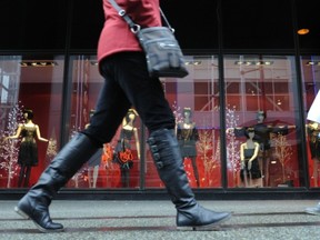 Commuters walk past Christmas shopping displays at Sears on Granville St. in Vancouver, BC., November 8, 2011.

(Nick Procaylo/PNG)