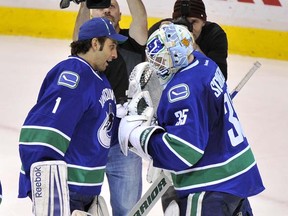 Who's on first? Roberto Luongo (left) or Cory Schneider? (Photo by Ian Lindsay, PNG)