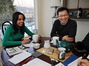 Ravjir Kaur Basra and Ed Shen share a laugh in Vancouver, Canada