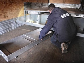 Paul Vogt shows secret compartment in commercial truck