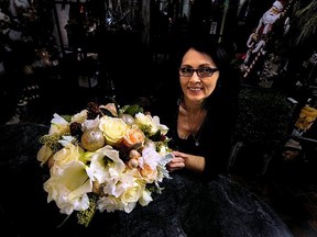 VANCOUVER, BC.: DECEMBER 7, 2011-Maureen Sullivan of Thomas Hobbs Florists with one of her table centre pieces in Vancouver, B.C.,  on  December 7, 2011.  (Steve Bosch/PNG)