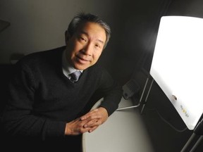 Dr. Ray Lam, director of UBC Hospital's Mood Disorders Centre, with lightbox
