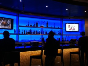 You can order alcoholic beverages at Cineplex's elegant VIP bar, but you can't take the drinks into the theatre.