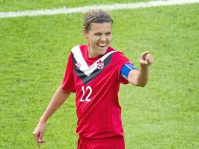 Canadian star striker and Burnaby native Christine Sinclair celebrates a goal at the FIFA women’s World Cup tournament last summer in Berlin, Germany. (Photo by Odd Andersen, AFP/Getty Images)