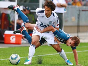 Perhaps the most at risk of getting his ticket punched out of Vancouver by the Whitecaps is Davide Chiumiento who, if new head coach Martin Rennie decides to employ a 4-3-3 formation this coming MLS season, doesn’t really fit into the plan. (Photo by Jeff Vinnick, Getty Images)