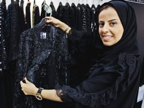 Three new books delve into the hidden world of female Muslim sexuality and how it's slowly changing. In this photo Saudi fashion designer Hania al-Braikan presents an abaya selling for about $1500 at a bridal exhibition in Dubai, United Arab Emirates. Just a few years ago, Gulf Arab women usually only felt comfortable showing off their fashion sense at ladies-only parties or family gatherings.