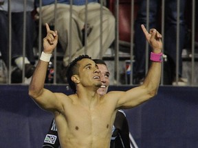 A shirtless Camilo celebrates his third goal against Colorado in the final game of the 2013 season.  Mark van Manen/ PNG Staff