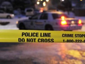 SURREY, BC -- JANUARY 15, 2013 --  Police cars and yellow tape block 112B Street after a deadly shooting  in Surrey  on January  15,  2013.    (Wayne Leidenfrost/ PNG) (For story for City)  [PNG Merlin Archive]