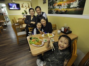 Cuu Long Vietnamese Restaurant. The Tran family with  Tiffany 6, her  brother Nathan, 4.
Mother Tien (next to Nathan)  along with her mother,  chef  Thao, (back left) and her Dad Long,
