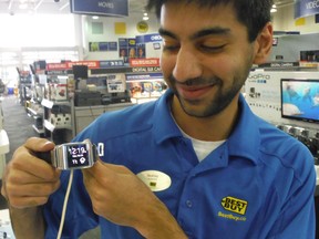Akshay Mukhi displays the James Bond-ish Galaxy Gear Smartwatch by Samsung, a fitness gadget loaded with features, including hands-free calling, GPS and distance tracker.
