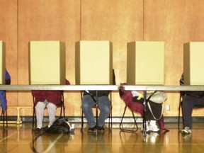 Vancouver- Voters fill out their ballots at Roundhouse Community Centre.