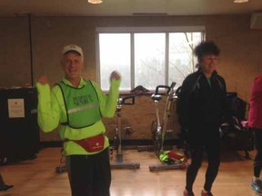 Clinic leader Brian Lalley and participant El O'Connor have some fun warming up for a Sunday morning run in Walnut Grove. The weekly get-togethers help to beat the winter blahs and push runners to continue training for the Sun Run.