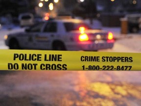 SURREY, BC -- JANUARY 15, 2013 --  Police cars and yellow tape block 112B Street after a deadly shooting  in Surrey  on January  15,  2013.    (Wayne Leidenfrost/ PNG) (For story for City)  [PNG Merlin Archive]