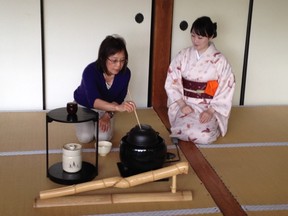 Carol Chow tries her hand at performing the tea ceremony