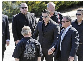 Glenn Sheck, fourth from the right, at Tom Gisby's May 2012 funeral