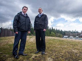 RCMP Staff Sgt. John Cater, right and Sgt. Chris Drotar of the provincial Unsolved Homicide Unit