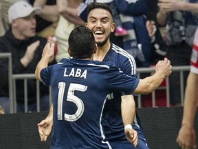 The defensive work of Matias Laba and the offensive creativity of Pedro Morales (right) played a huge part in Saturday’s 1-0 Whitecaps win over the host Columbus Crew. (Steve Bosch, PNG files)
