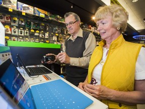 George Hayhoe and his wife Arleigh shopping for a computer.