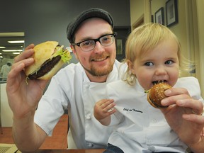 Chef David Ediger and 15 month old Eleanor Ediger are big fans of burgers