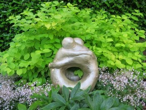 Embrace sculpture in the garden of Jennifer Buckland and Van Eriksen