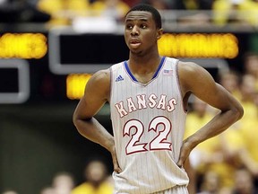 Kansas guard Andrew Wiggins looks on during a break in the second half of an NCAA basketball game against Iowa State in Ames, Iowa, last season. (Charlie Neibergall, Associated Press)